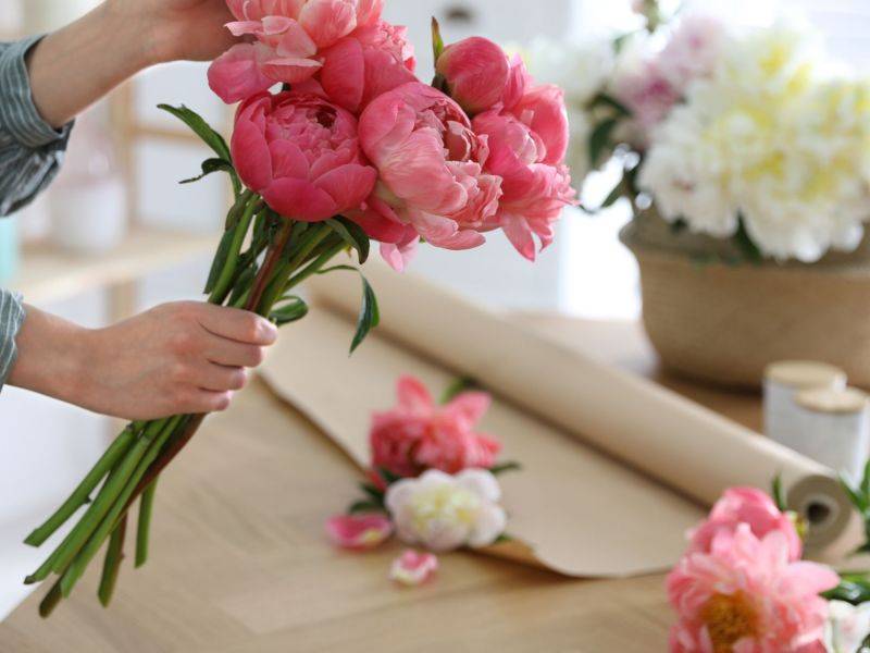 Floral arrangement with pink long stem flowers
