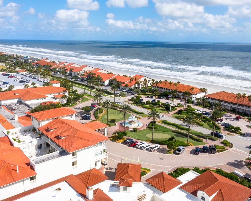 aerial shot of the inn and the beach