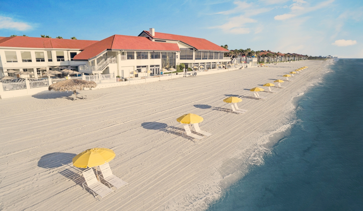 PVIC beach front with yellow umbrellas