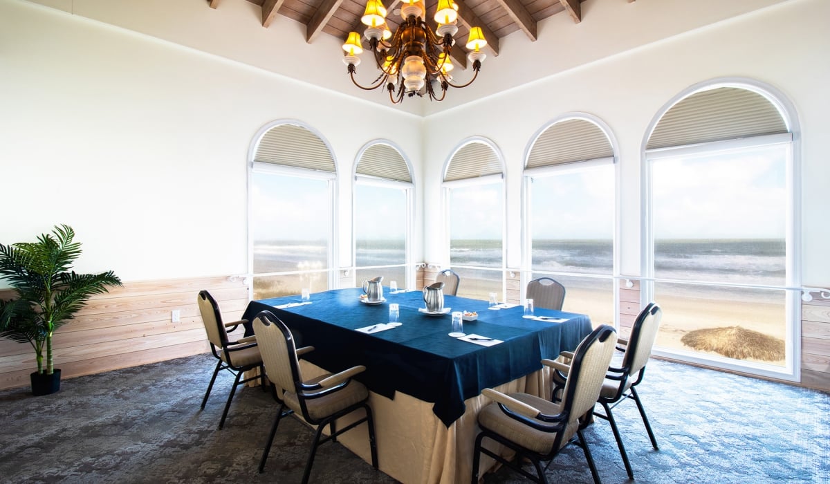 Table set for six in the Conservatory with navy a table cloth