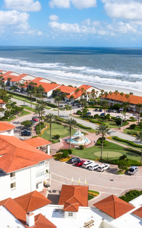 aerial shot of the inn and the beach