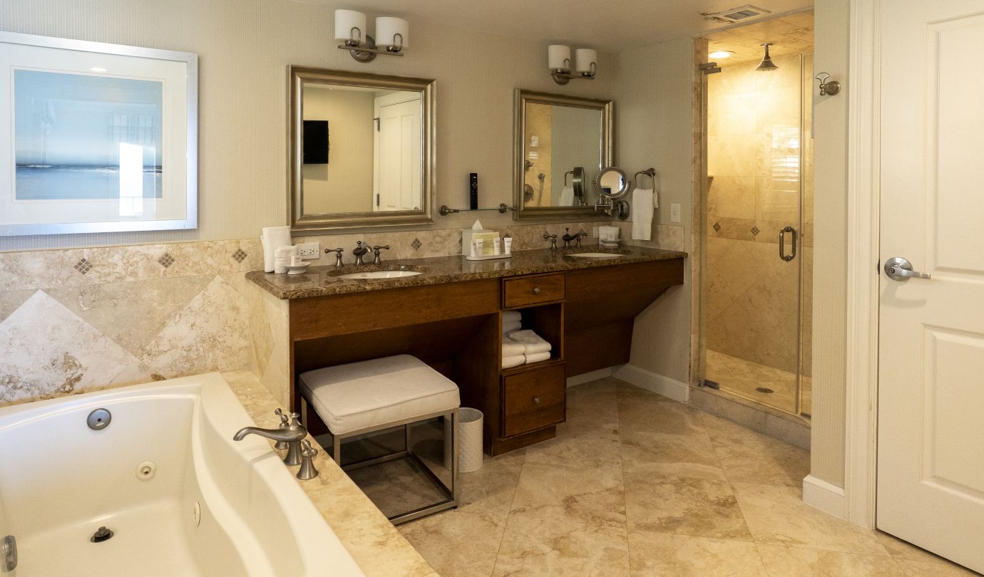 guest room bathroom with tub and sink