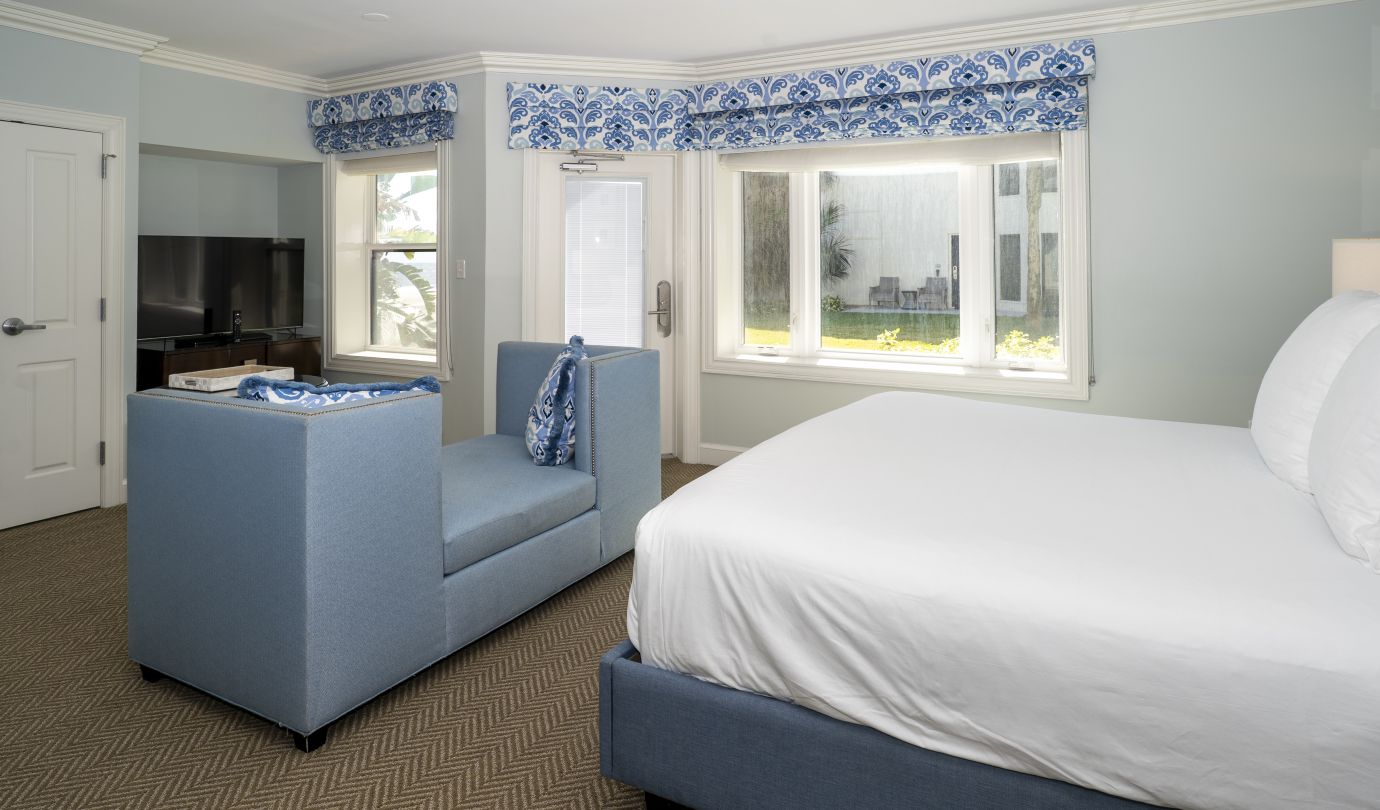 guest room with bed and couch