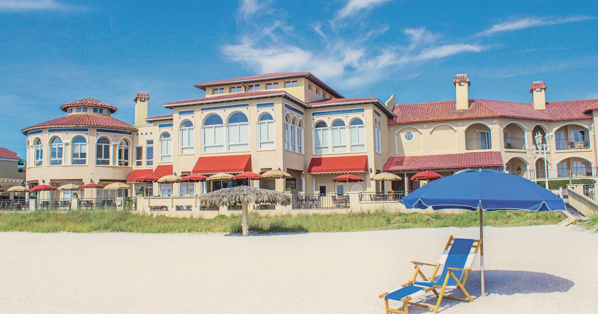 lodge beach front with blue lounge chair