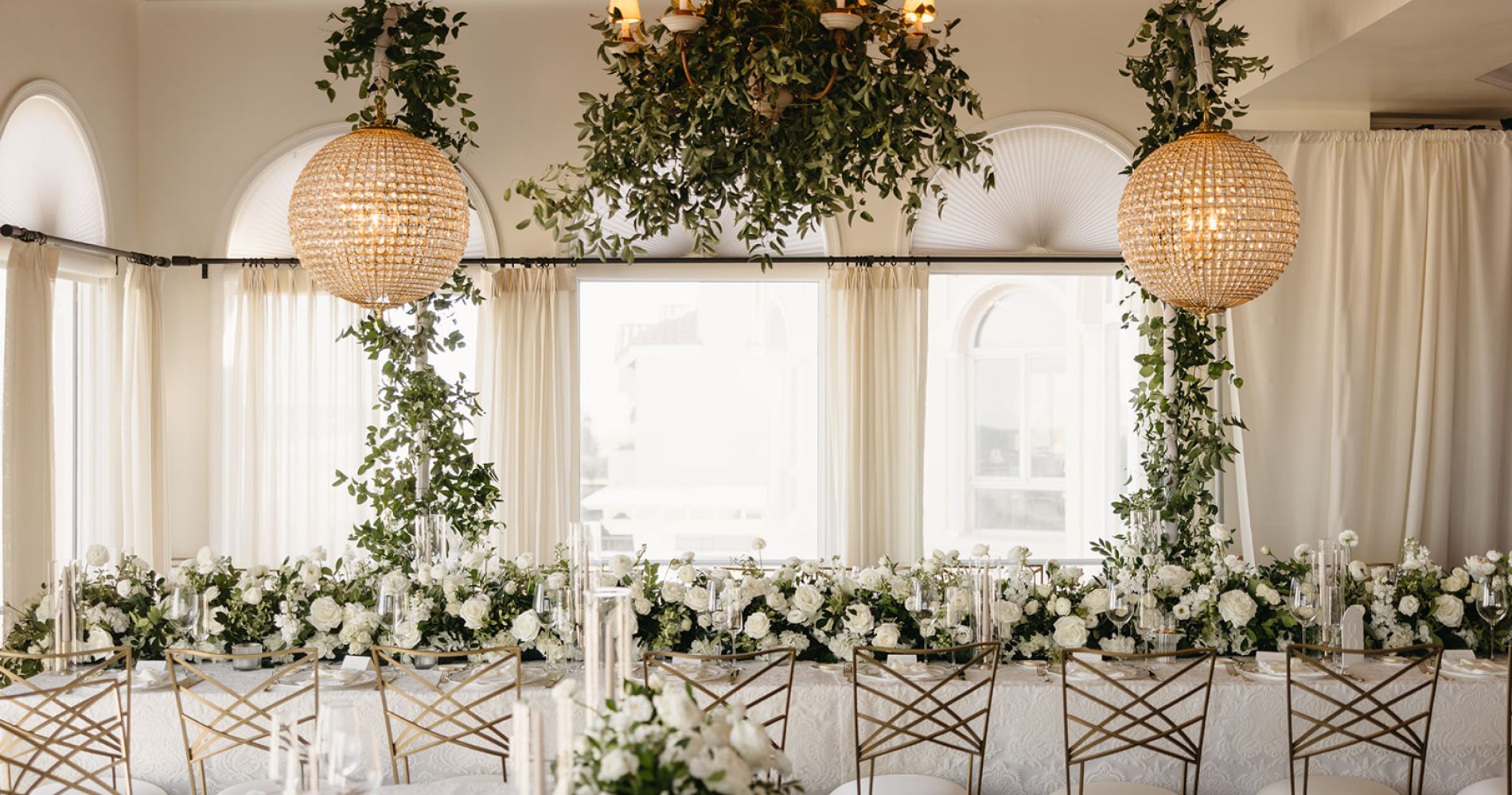 wedding reception in a ballroom with ocean view