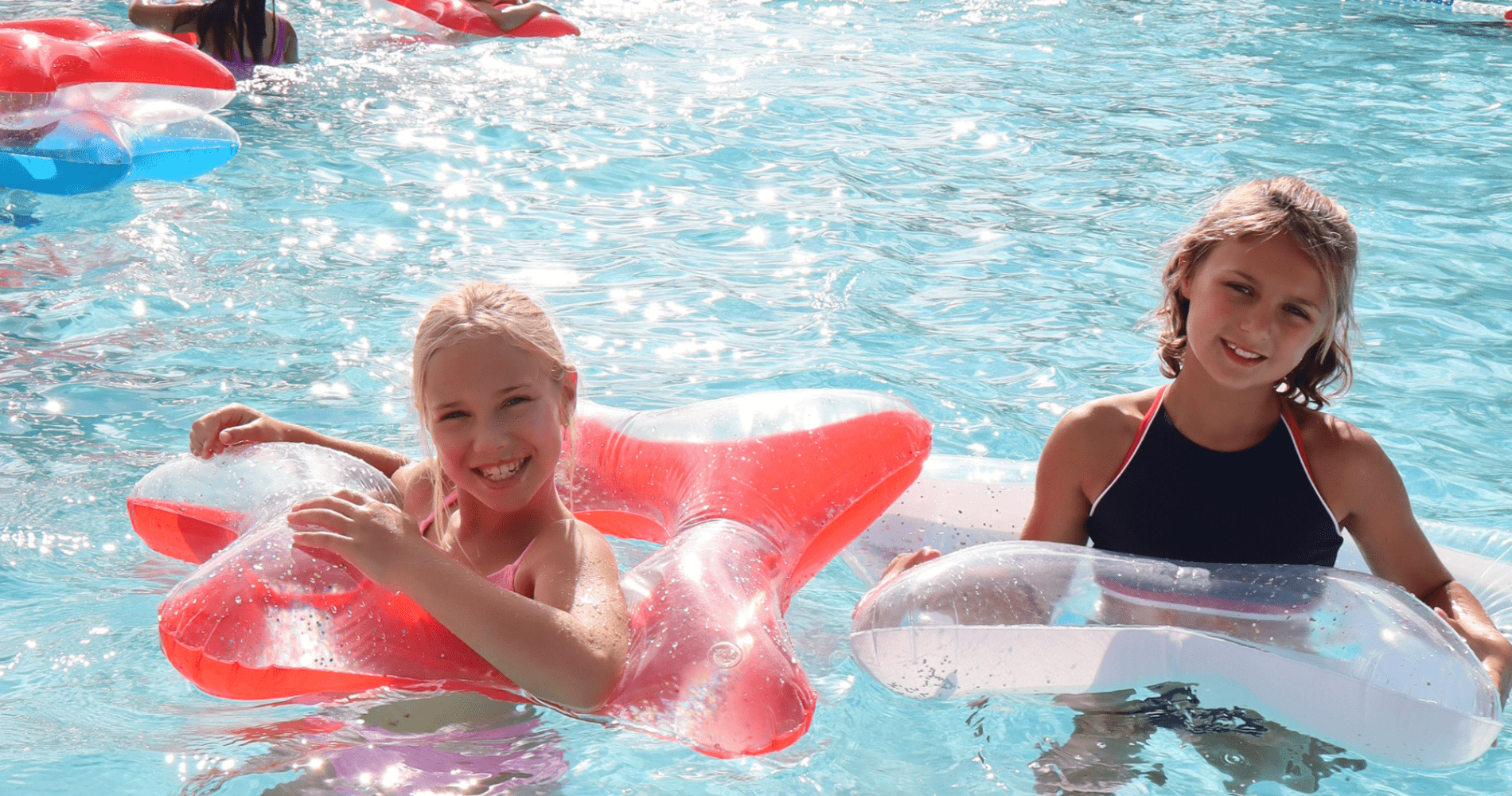 Children with floaties swimming in the Family Pool