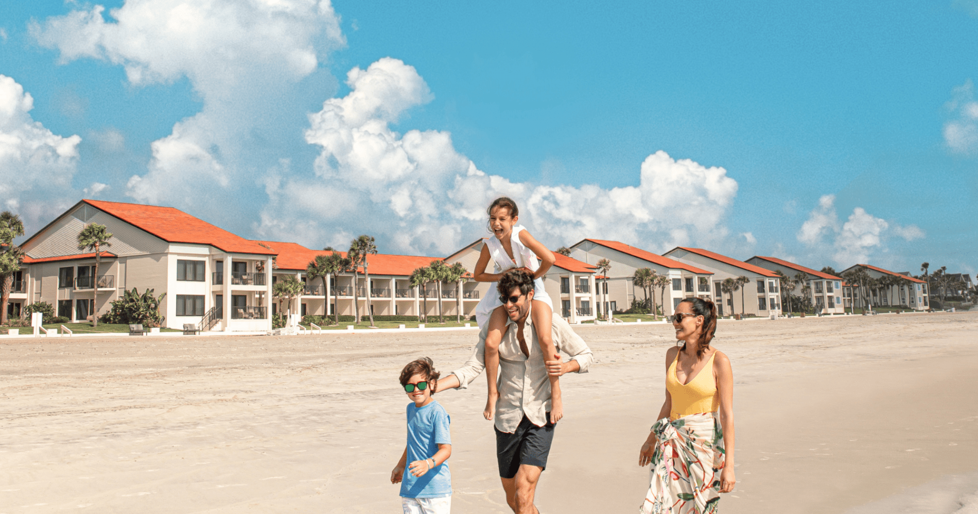 Family Walking Along Shore