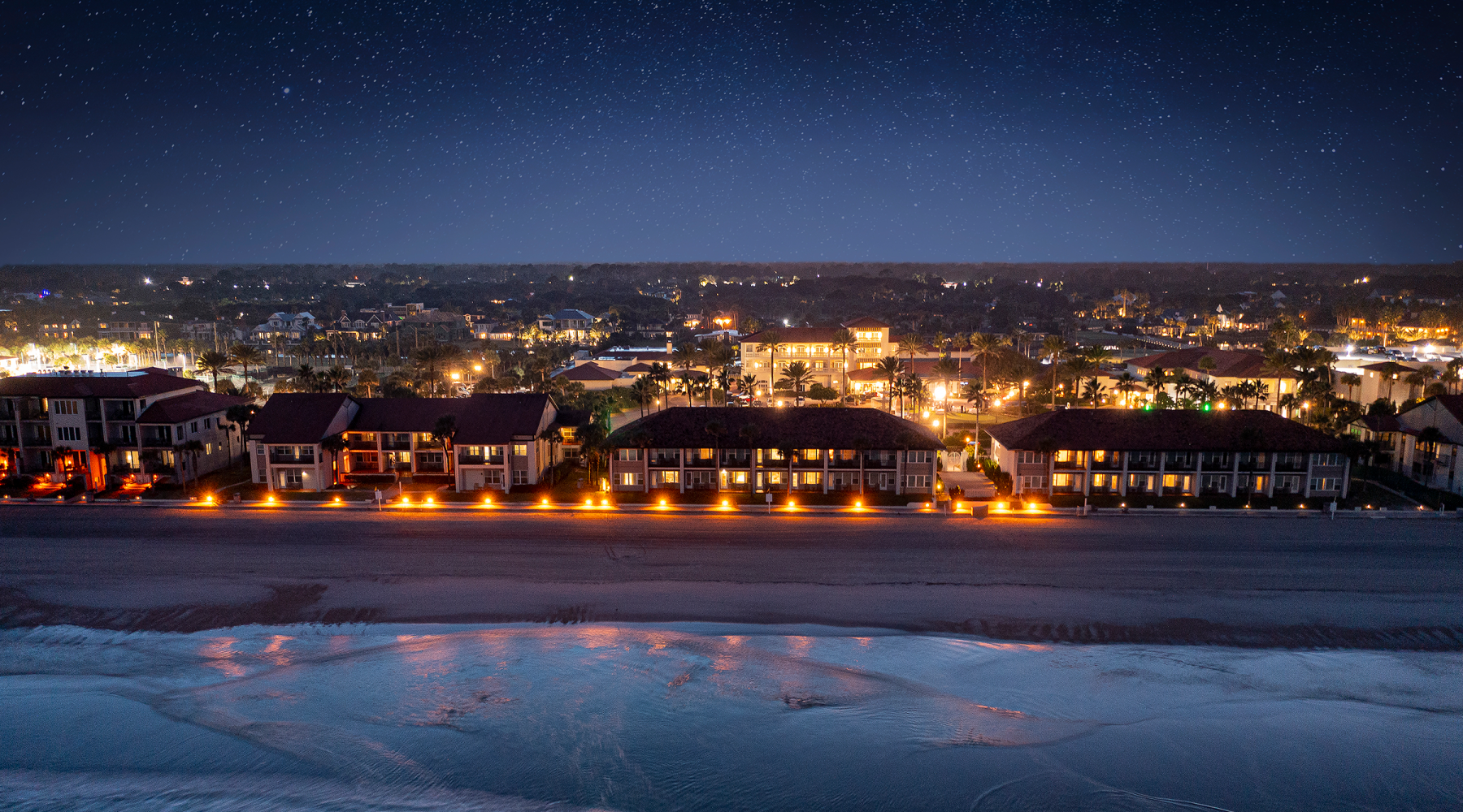Night time view of Ponte Vedra Inn & Club from the beach